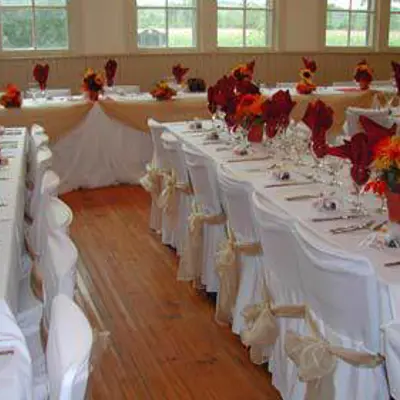 A wedding place setting within a mid-century building.